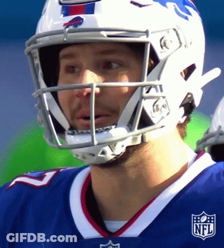 A Football Player Wearing A Helmet With The Nfl Logo On His Chest GIF