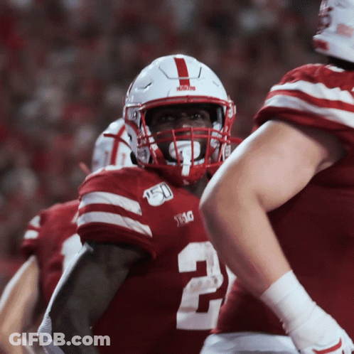 A Football Player Wearing A Helmet With The Number 2 On It GIF