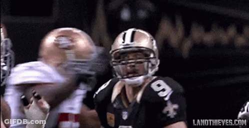 A Football Player Wearing A Helmet With The Number 9 On It GIF