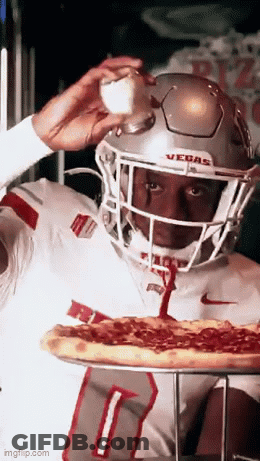 A Football Player Wearing A Helmet With Vegas On It GIF