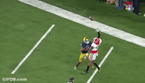 A Football Player Wearing A Jersey That Says Notre Dame On It GIF
