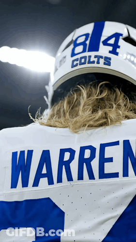 A Football Player Wearing A Jersey That Says Warren On The Back GIF