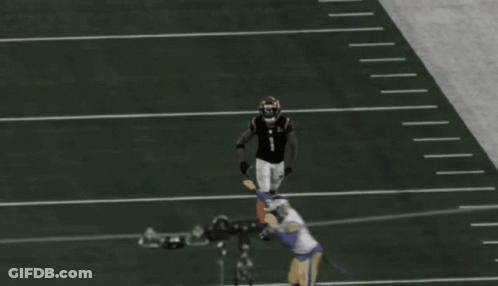 A Football Player Wearing A Jersey With The Letter K On It GIF