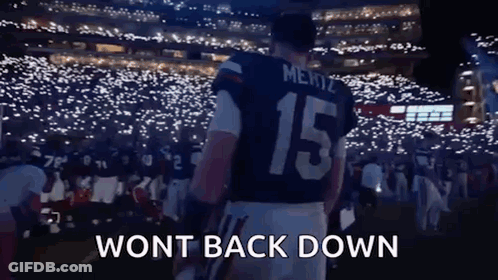 A Football Player Wearing A Jersey With The Number 15 On It GIF