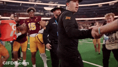 A Football Player Wearing A Jersey With The Number 15 On It GIF