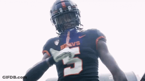 A Football Player Wearing A Jersey With The Number 5 GIF