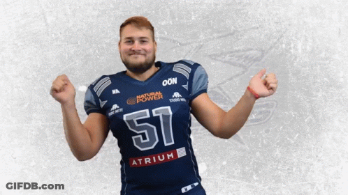 A Football Player Wearing A Jersey With The Number 51 On It GIF