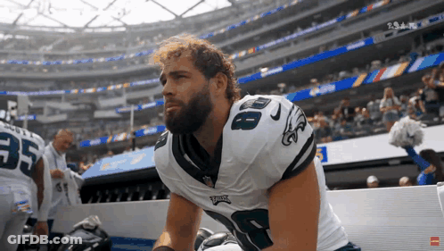 A Football Player Wearing A Jersey With The Number 8 On It GIF