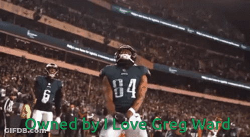 A Football Player Wearing A Jersey With The Number 84 On It GIF