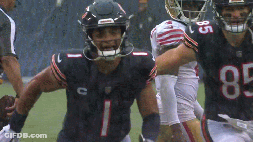 A Football Player Wearing A Jersey With The Number 85 On It GIF