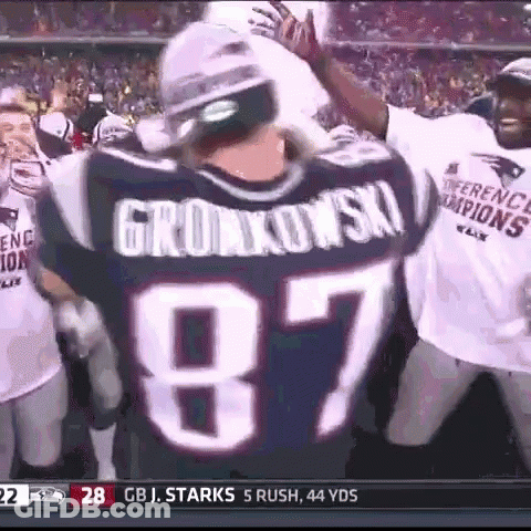 A Football Player Wearing A Jersey With The Number 87 GIF