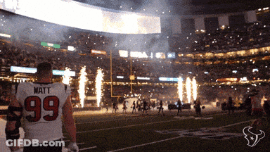 A Football Player Wearing A Jersey With The Number 99 GIF