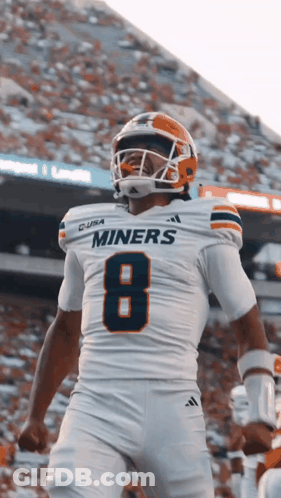 A Football Player Wearing A Miners Jersey With The Number 8 GIF