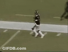 A Football Player Wearing A Number 1 Jersey Is Running On The Field GIF