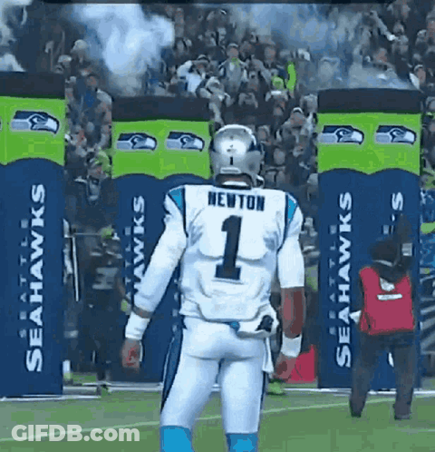 A Football Player Wearing A Number 1 Jersey Is Walking On The Field GIF