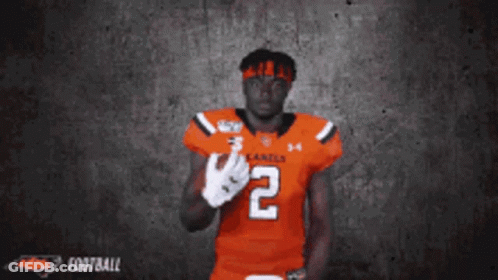 A Football Player Wearing A Number 2 Jersey GIF
