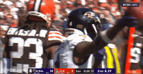 A Football Player Wearing A Number 23 Jersey GIF