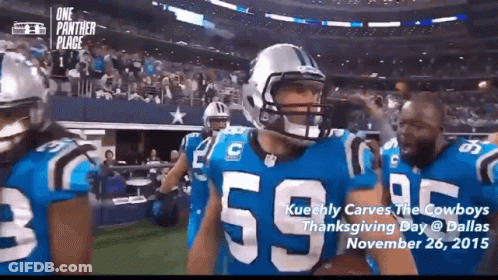 A Football Player Wearing A Number 55 Jersey Stands On The Field GIF