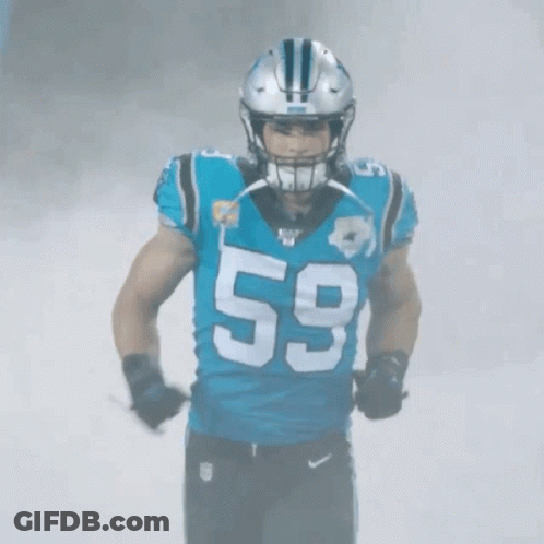 A Football Player Wearing A Number 59 Jersey GIF