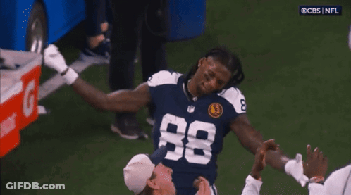 A Football Player Wearing A Number 88 Jersey GIF