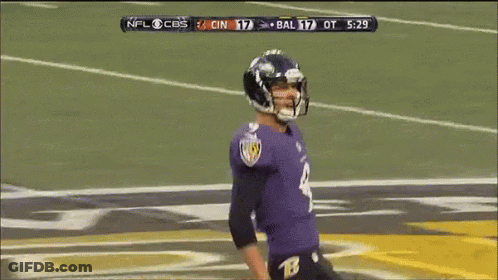 A Football Player Wearing A Number 9 Jersey Is Dancing On The Field GIF