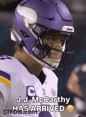 A Football Player Wearing A Purple Helmet With The Words `` J.j. Mccarthy Has Arrived '' On It . GIF