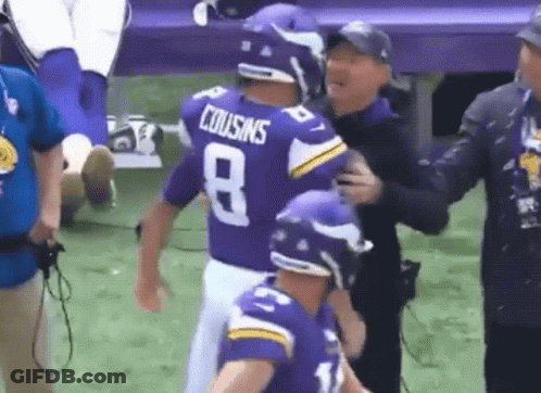 A Football Player Wearing A Purple Jersey With The Number 8 On It GIF
