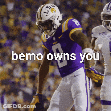 A Football Player Wearing A Purple Uniform With The Number 8 On It GIF