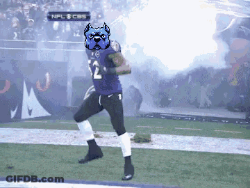 A Football Player Wearing A Ravens Jersey Is Running On A Field GIF