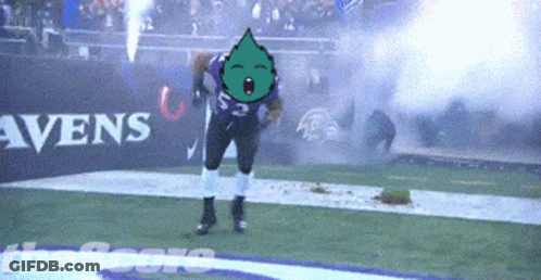 A Football Player Wearing A Ravens Jersey Stands On The Field GIF