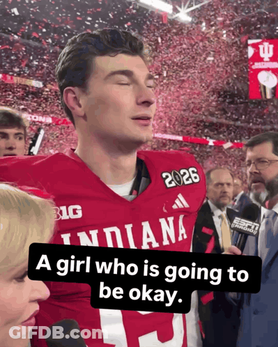 A Football Player Wearing A Red Indiana Jersey GIF