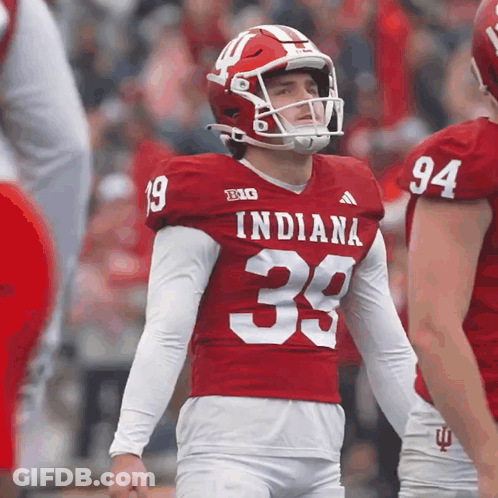A Football Player Wearing A Red Indiana Jersey GIF