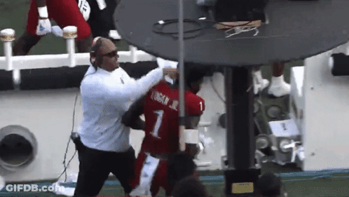 A Football Player Wearing A Red Jersey With The Number 1 On It GIF