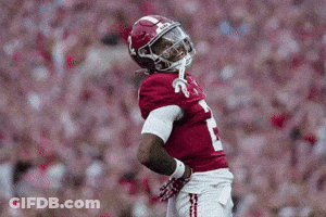 A Football Player Wearing A Red Jersey With The Number 1 On The Front GIF