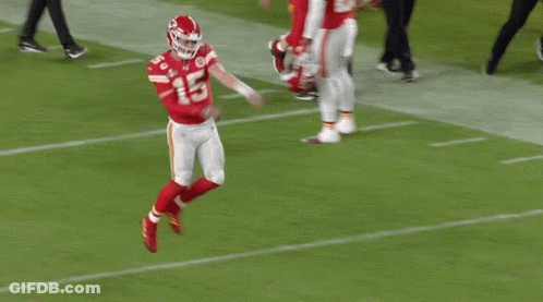 A Football Player Wearing A Red Jersey With The Number 15 On It GIF