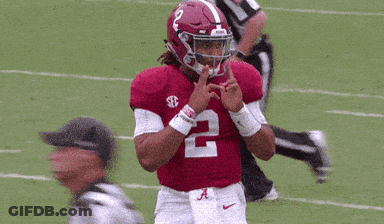 A Football Player Wearing A Red Jersey With The Number 2 GIF