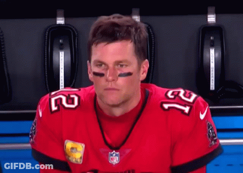 A Football Player Wearing A Red Jersey With The Number 21 On It GIF