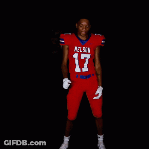 A Football Player Wearing A Red Uniform With Nelson 17 On The Front GIF