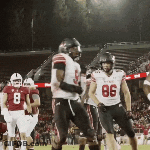 A Football Player Wearing A Utah Jersey Stands On The Field GIF