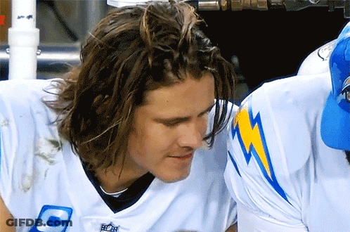 A Football Player Wearing A White Jersey With The Letter C On It GIF