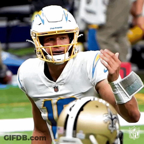 A Football Player Wearing A White Jersey With The Number 10 On It GIF