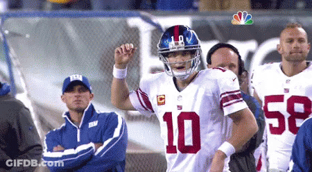 A Football Player Wearing A White Jersey With The Number 10 On The Front GIF