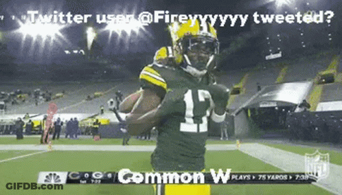 A Football Player Wearing Number 15 Is Running With The Ball GIF