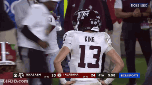 A Football Player Wearing The Number 13 Stands On The Field GIF