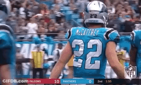 A Football Player Wearing The Number 32 Jersey GIF