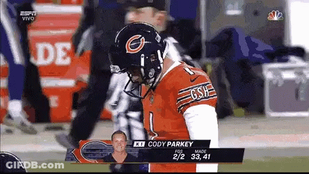A Football Player With The Name Cody Parkey On The Back Of His Jersey GIF