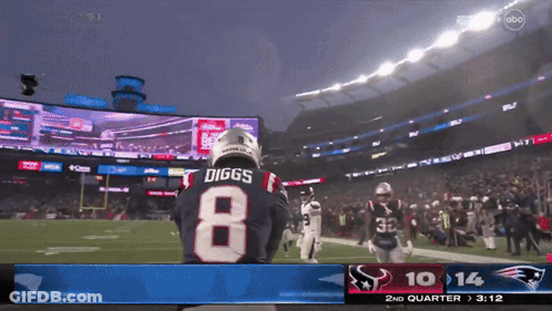 A Football Player With The Name Diggs On His Back GIF