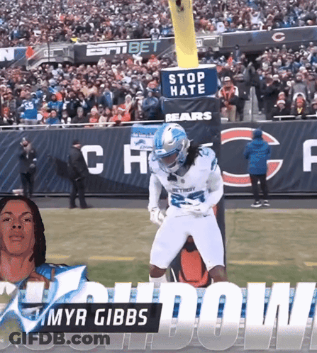 A Football Player With The Name Myr Gibbs On His Jersey GIF