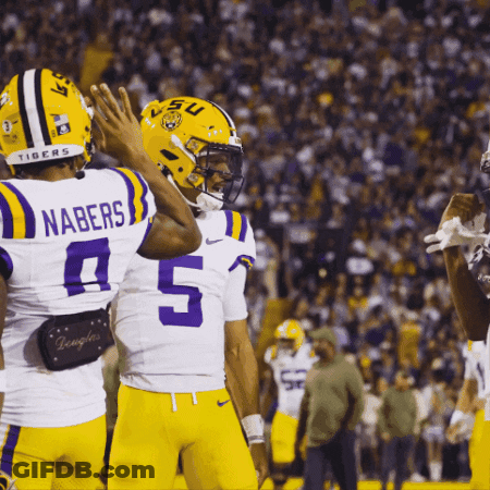 A Football Player With The Name Nabers On His Back GIF
