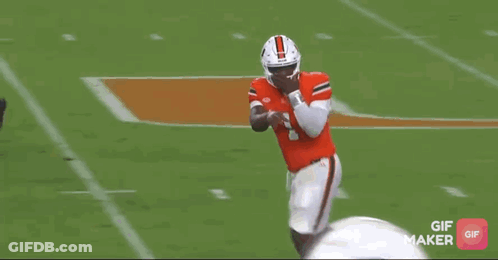 A Football Player With The Number 1 On His Helmet Covering His Mouth GIF
